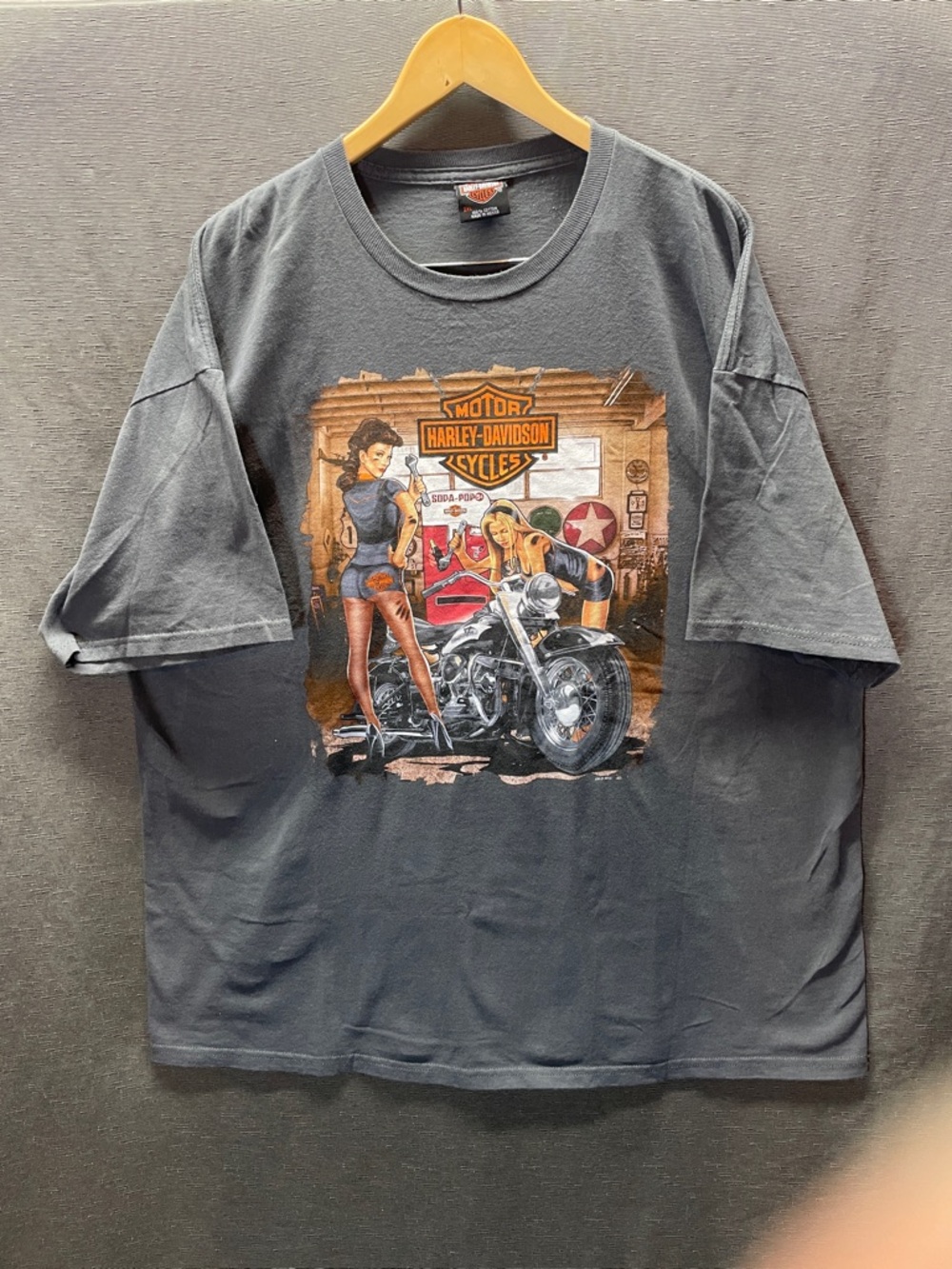 Harley-Davidson charcoal tee with orange and red vintage motorcycle graphic